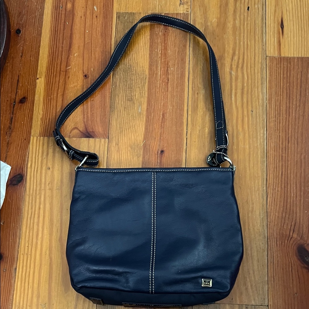 Navy leather handbag by The Sak
